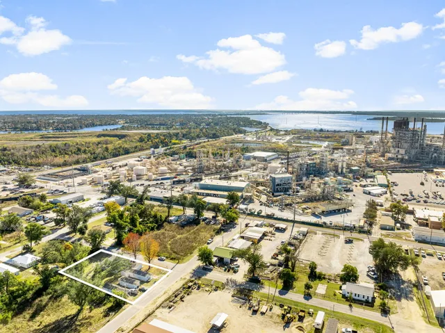 a view of a pool table and chairs