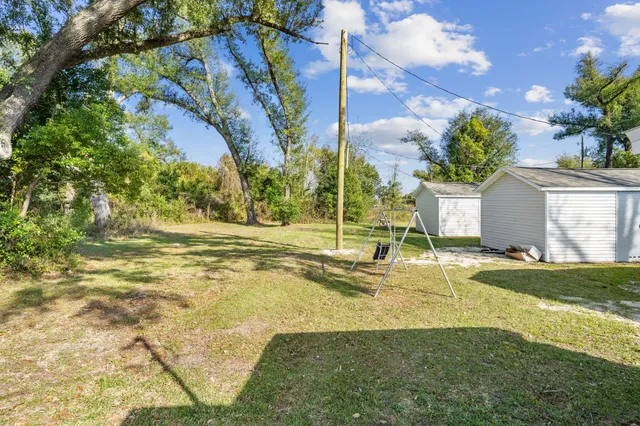 an aerial view of residential building with parking space