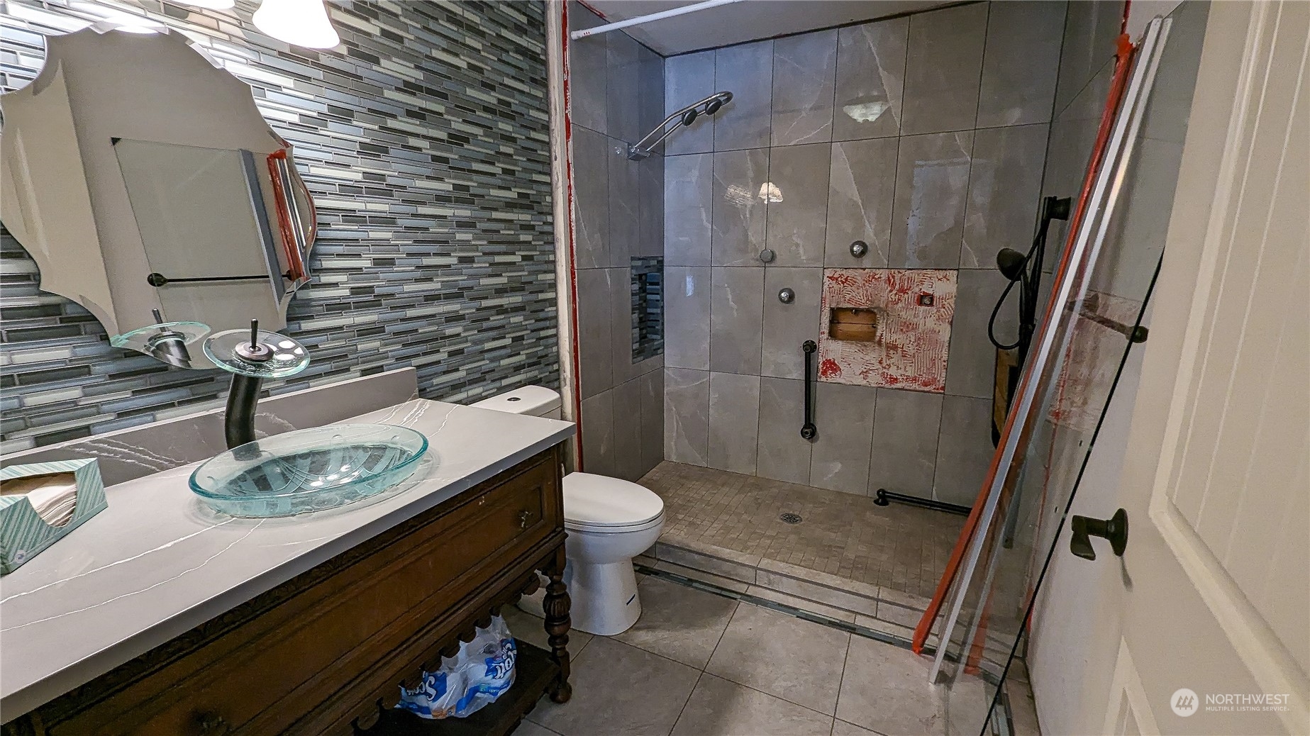 740 Cape Labelle Road Tonasket, WA 98855 - Photo 13 of 40 a bathroom with a granite countertop sink toilet and shower