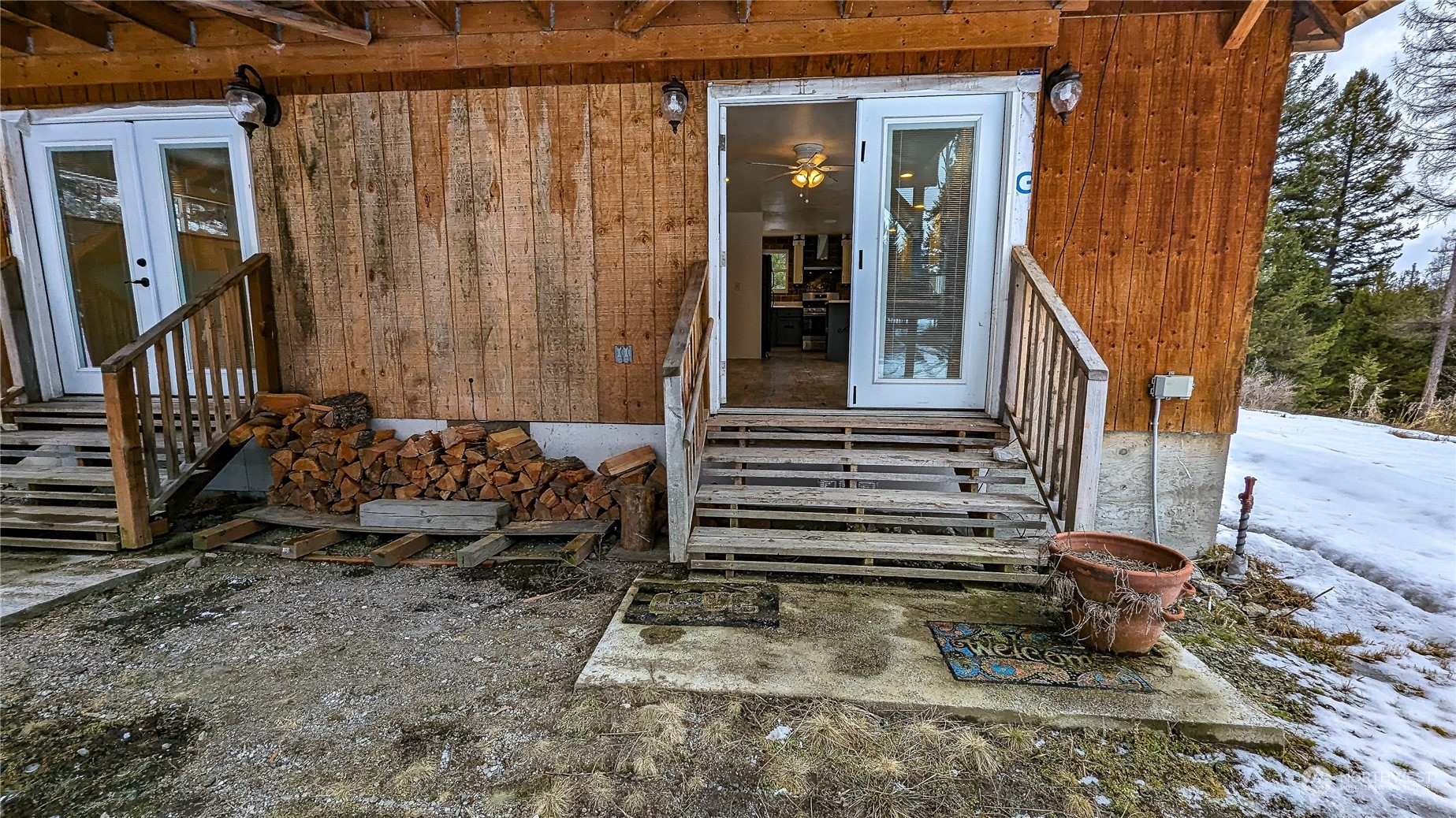 740 Cape Labelle Road Tonasket, WA 98855 - Photo 5 of 40 a view of a house with a yard