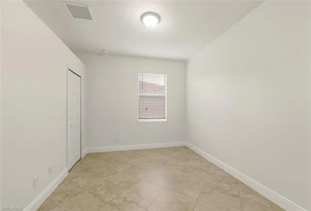 an empty room with a window