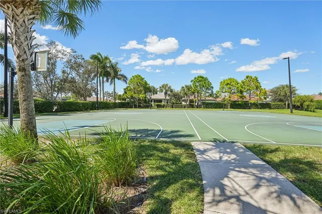 a view of a golf course with a lake