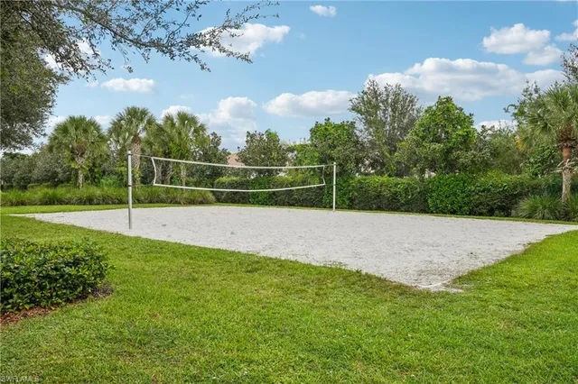 a view of a golf course with a lake