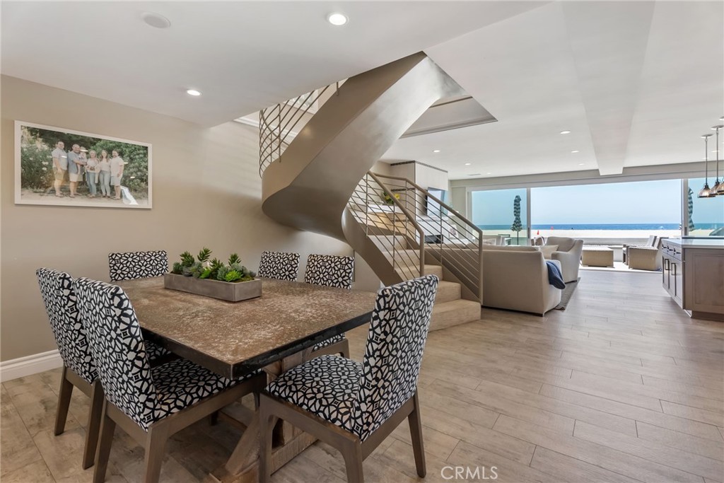 4403 Seashore Drive Newport Beach, CA 92663 - Photo 22 of 69 a dining room with furniture and wooden floor