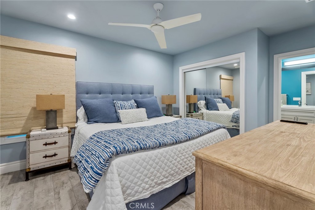 4403 Seashore Drive Newport Beach, CA 92663 - Photo 23 of 69 a bedroom with a bed and a dresser