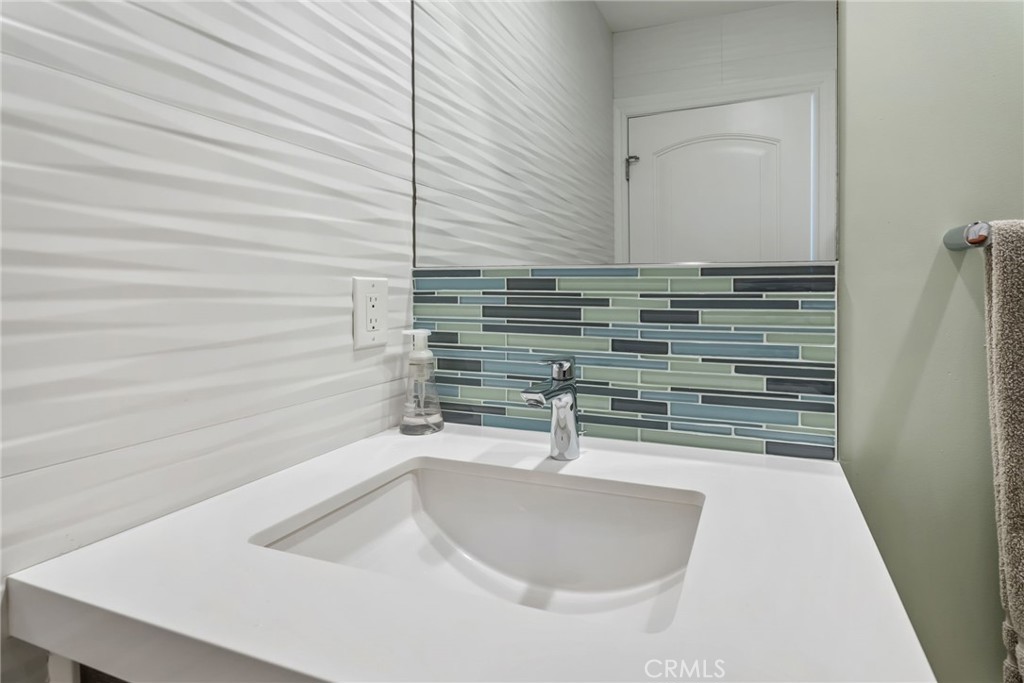 4403 Seashore Drive Newport Beach, CA 92663 - Photo 37 of 69 a bathroom with a sink and a wooden roof