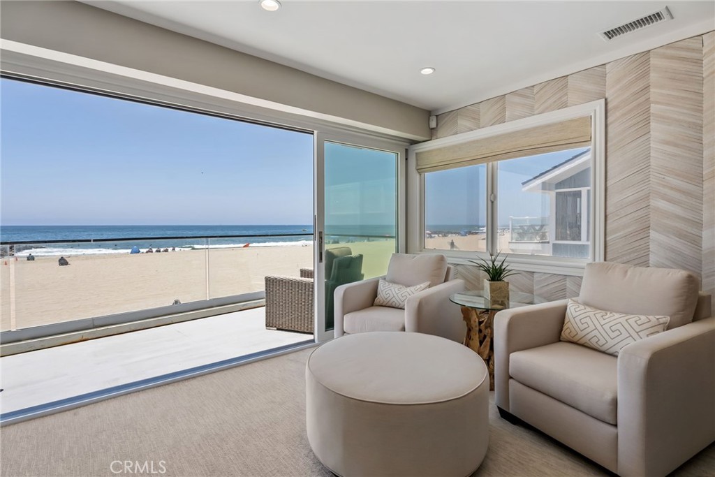 4403 Seashore Drive Newport Beach, CA 92663 - Photo 43 of 69 a living room with furniture and a large window