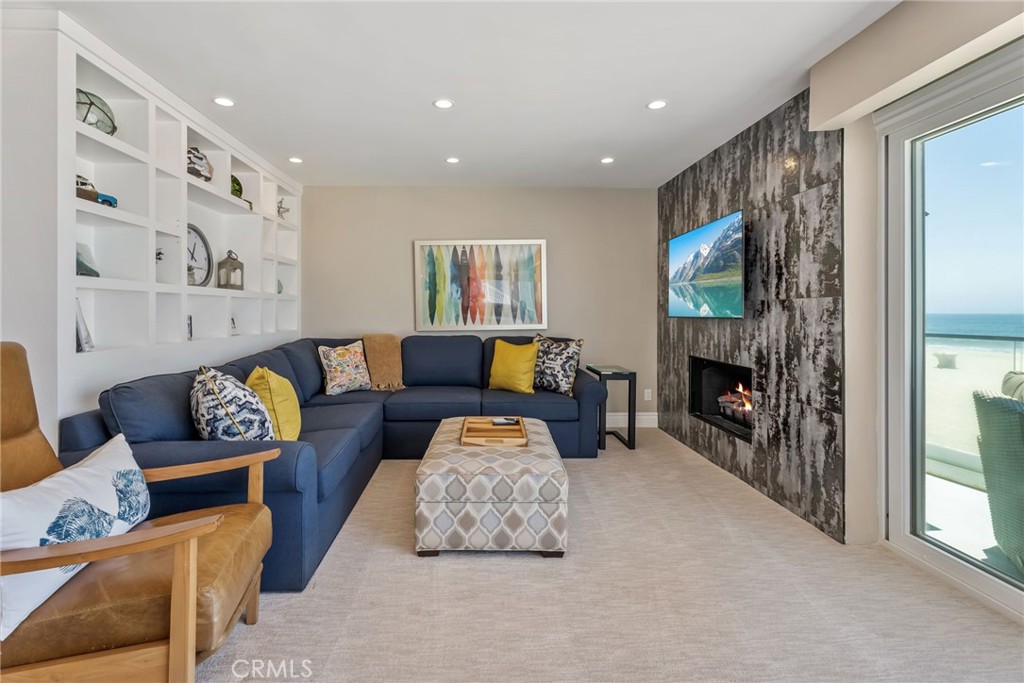 4403 Seashore Drive Newport Beach, CA 92663 - Photo 44 of 69 a living room with furniture and a flat screen tv