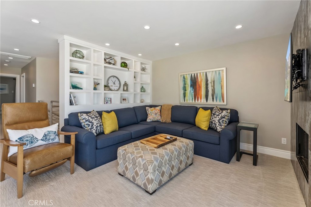 4403 Seashore Drive Newport Beach, CA 92663 - Photo 45 of 69 a living room with furniture and a painting