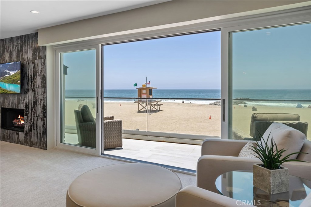 4403 Seashore Drive Newport Beach, CA 92663 - Photo 49 of 69 a living room with furniture and a flat screen tv