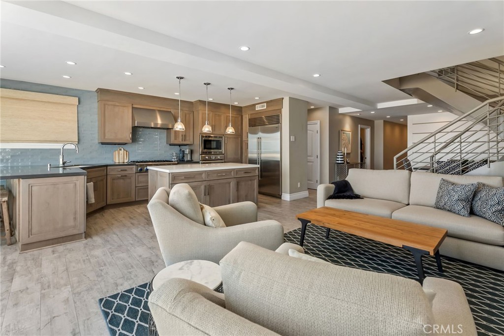 4403 Seashore Drive Newport Beach, CA 92663 - Photo 53 of 69 a living room with furniture and a large window