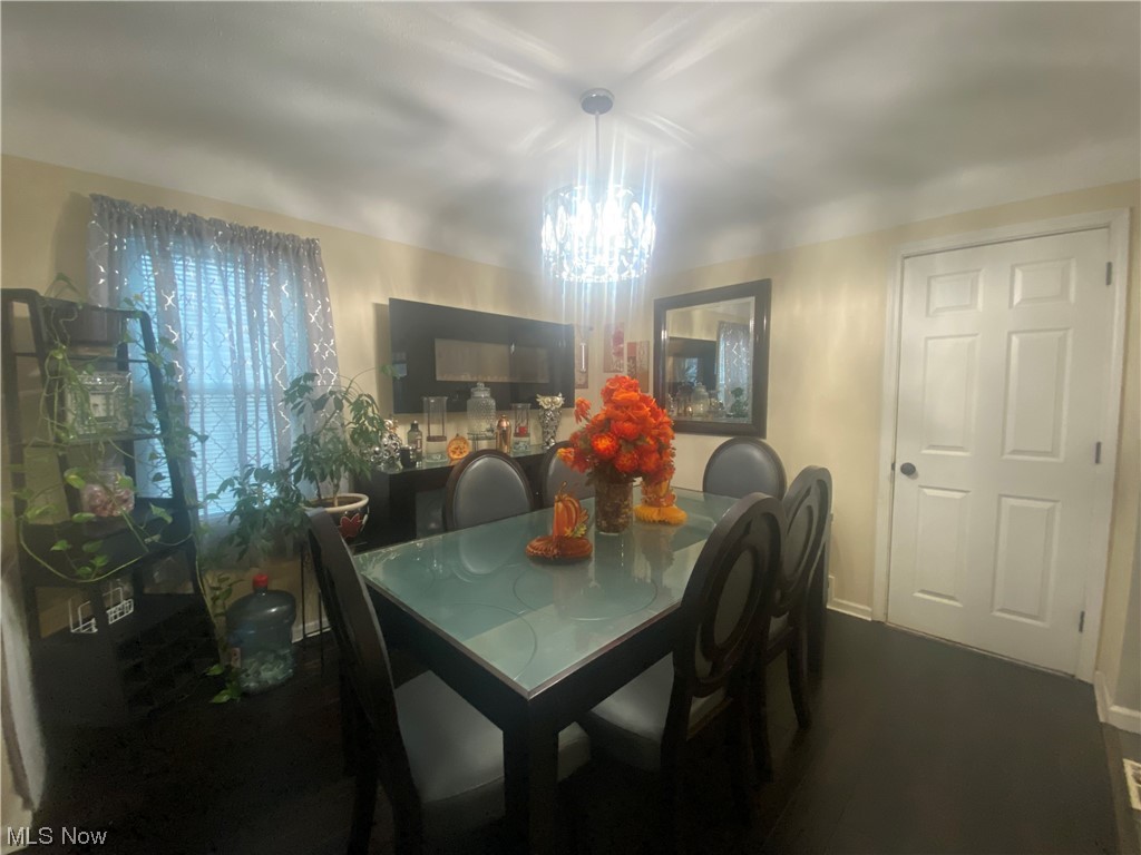 1500 Edgefield Road Lyndhurst, OH 44124 - Photo 8 of 24 Dining space with a notable chandelier