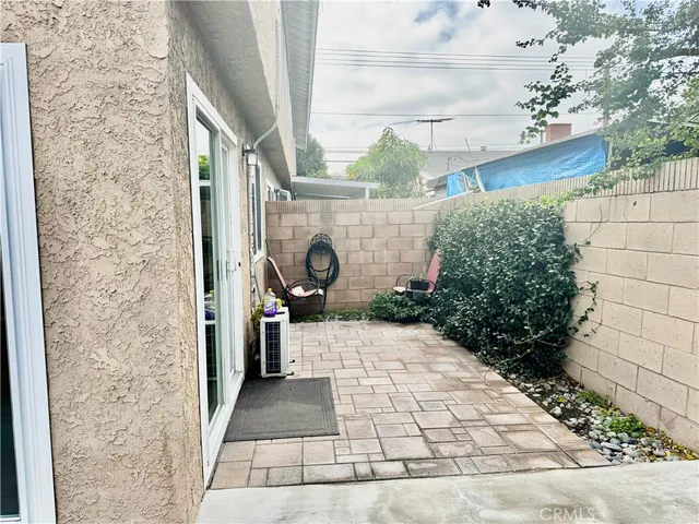 a view of a entryway with wooden floor