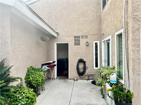 a view of a backyard of the house