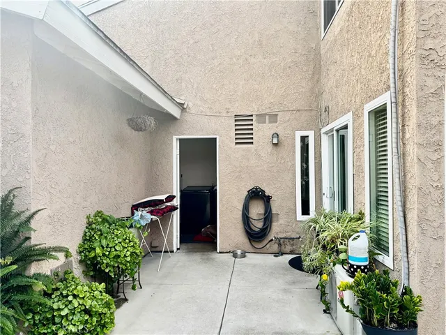 a view of a backyard of the house