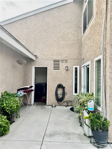a view of a house with a street