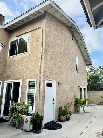 a house view with a garden space