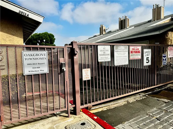 a view of yard with swimming pool and green space