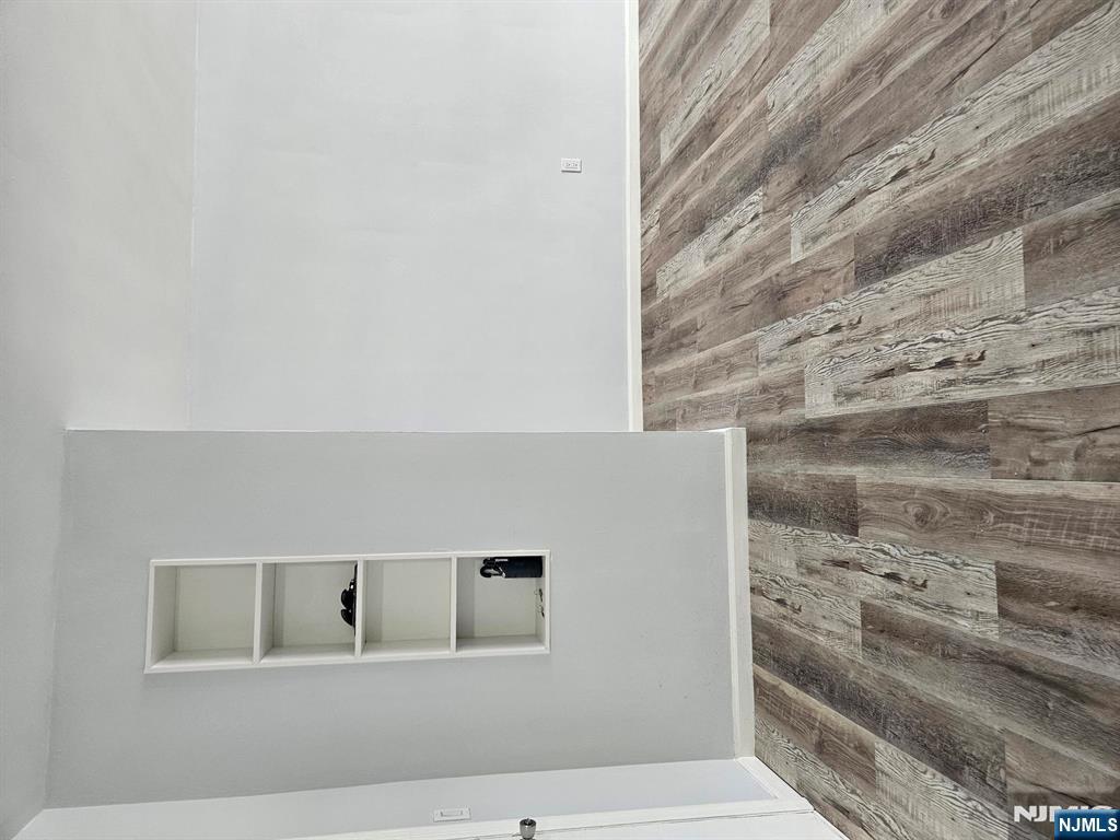 605 Grove Street, Unit F8 Clifton, NJ 07013 - Photo 6 of 15 a view of a room with wooden floor