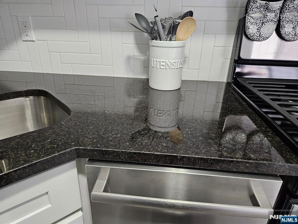 605 Grove Street, Unit F8 Clifton, NJ 07013 - Photo 9 of 15 a close view of sink and tap