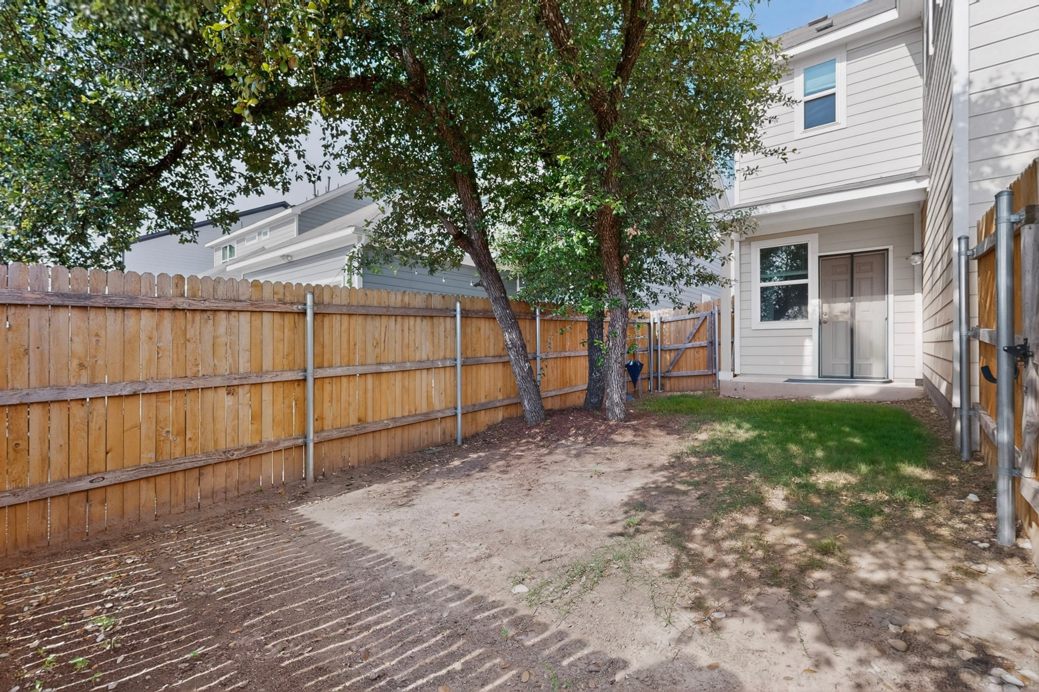 2524 Acoma Lane Leander, TX 78641 - Photo 26 of 27 a backyard of a house with lots of green space