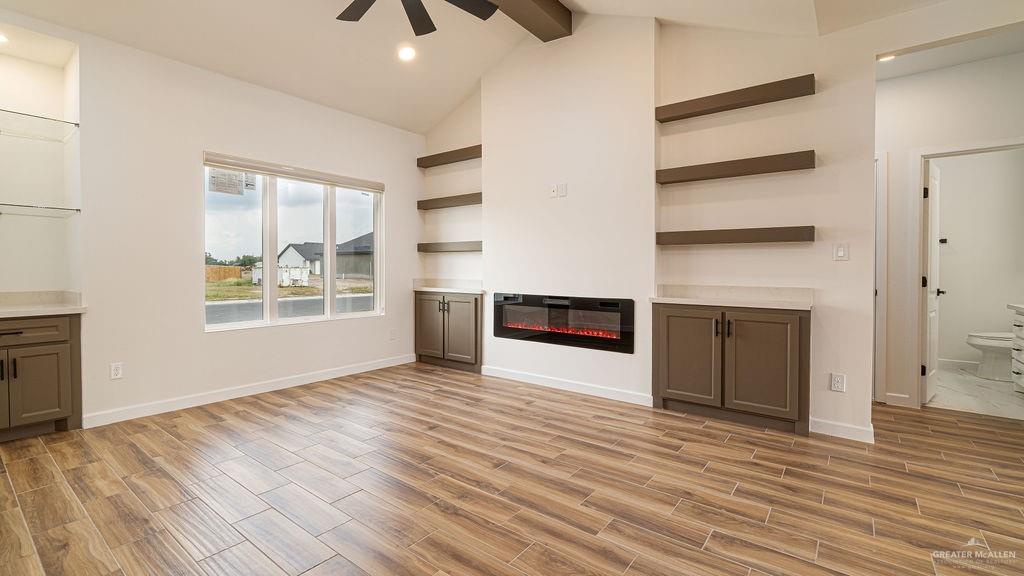 1212 East Acacia Drive East San Juan, TX 78589 - Photo 6 of 16 a view of an empty room with a window and fireplace