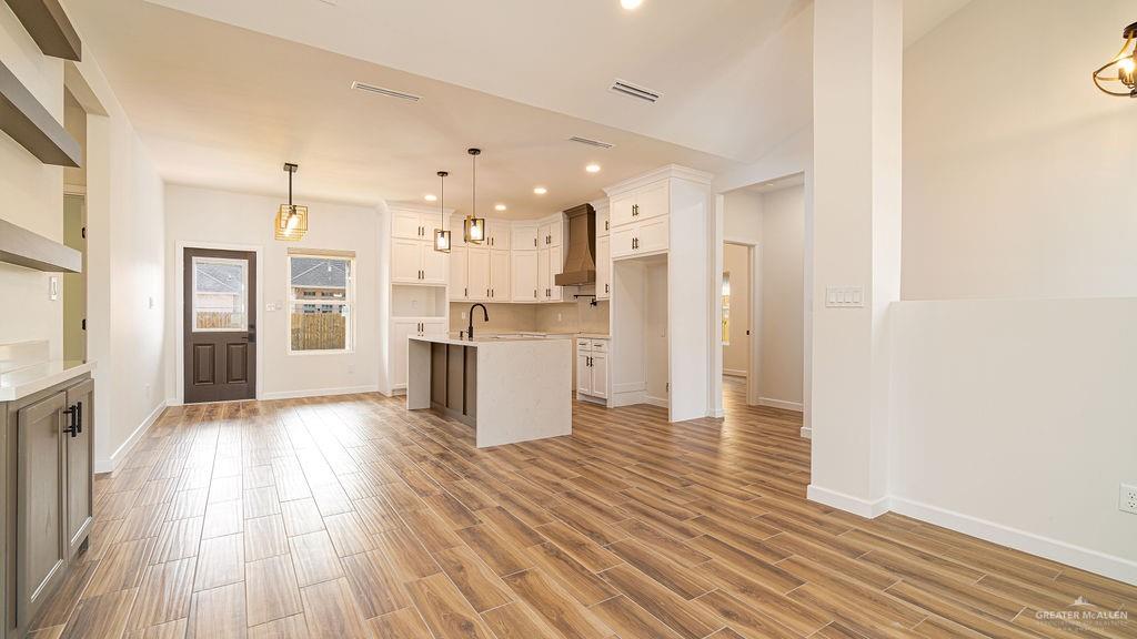 1212 East Acacia Drive East San Juan, TX 78589 - Photo 7 of 16 a view of kitchen view wooden floor and window