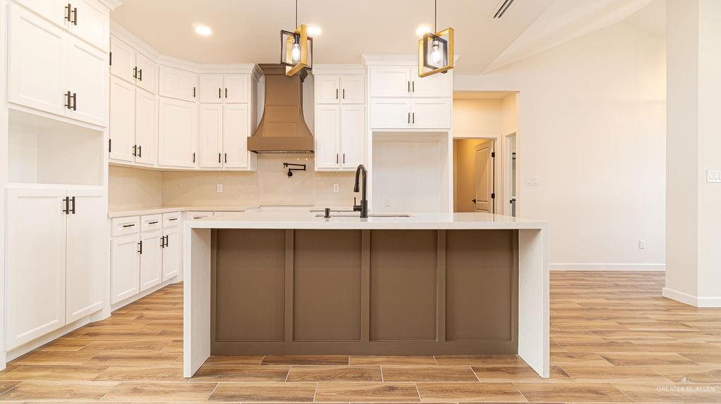 1212 East Acacia Drive East San Juan, TX 78589 - Photo 8 of 16 a kitchen with a sink stainless steel appliances and cabinets