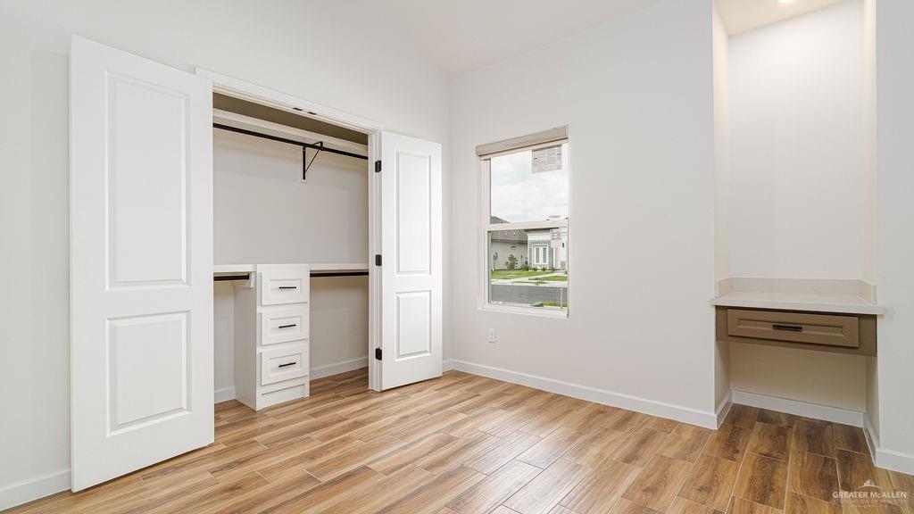 1212 East Acacia Drive East San Juan, TX 78589 - Photo 9 of 16 an empty room with windows and closet