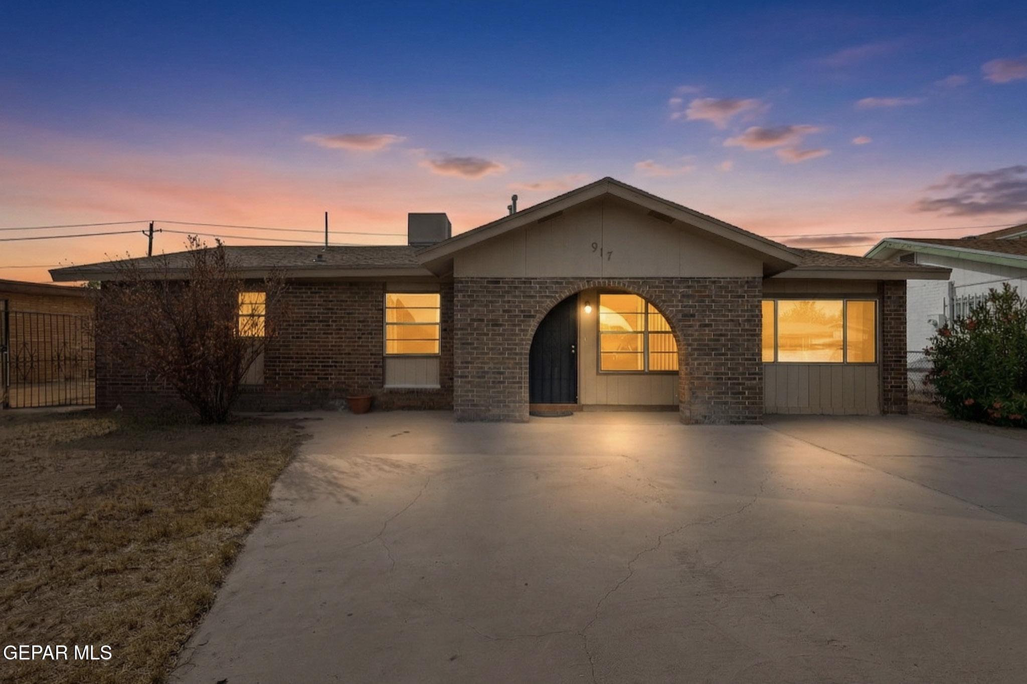 917 Marigold Way El Paso, TX 79907 - Photo 1 of 38 a view of a big room with a yard