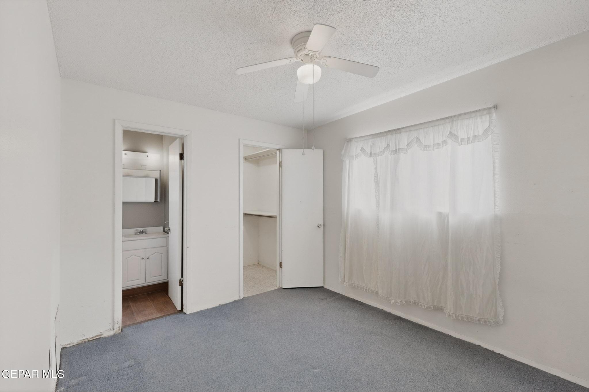 917 Marigold Way El Paso, TX 79907 - Photo 14 of 38 a view of an empty room with a bathroom