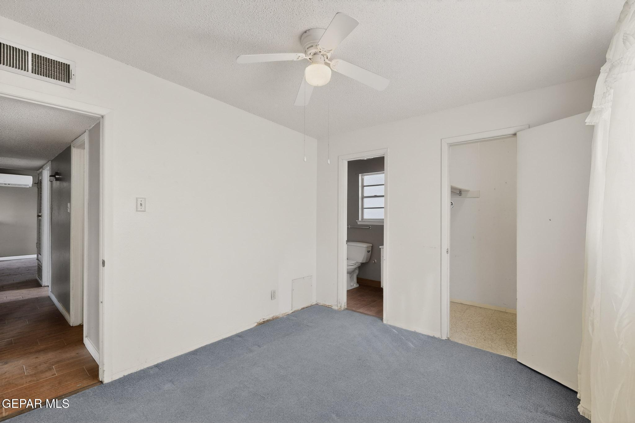 917 Marigold Way El Paso, TX 79907 - Photo 15 of 38 a view of empty room with a ceiling fan