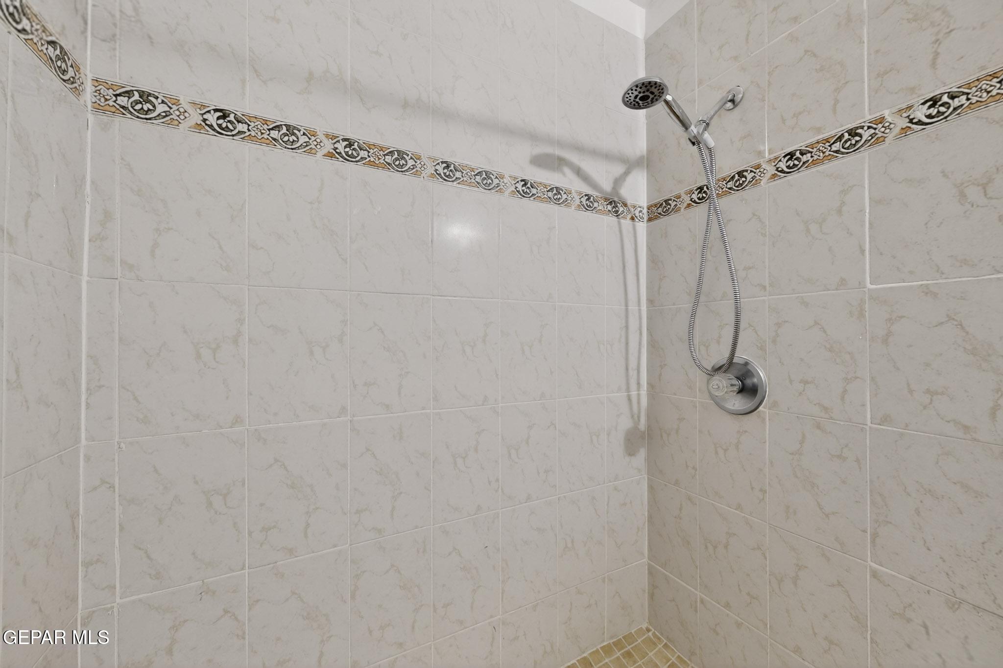 917 Marigold Way El Paso, TX 79907 - Photo 27 of 38 a bathroom with a shower