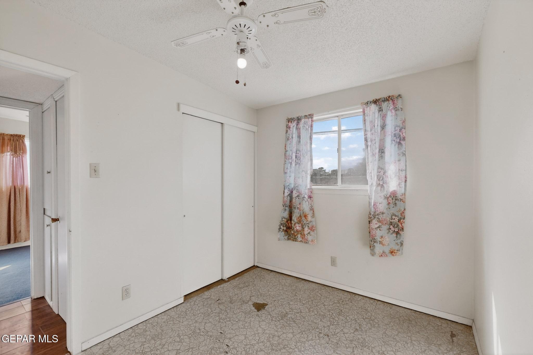 917 Marigold Way El Paso, TX 79907 - Photo 29 of 38 an empty room with windows