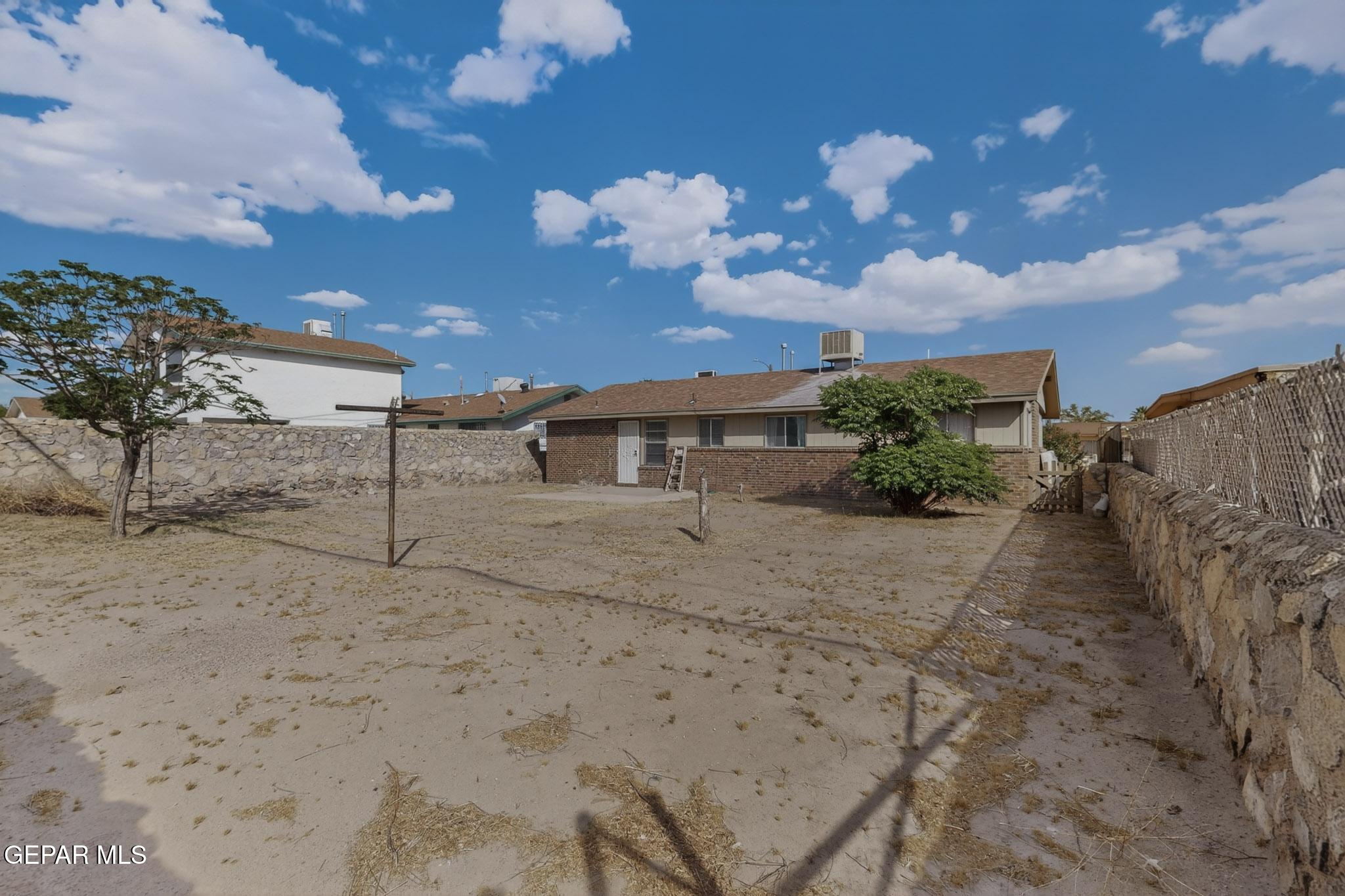 917 Marigold Way El Paso, TX 79907 - Photo 36 of 38 a view of a house with a yard