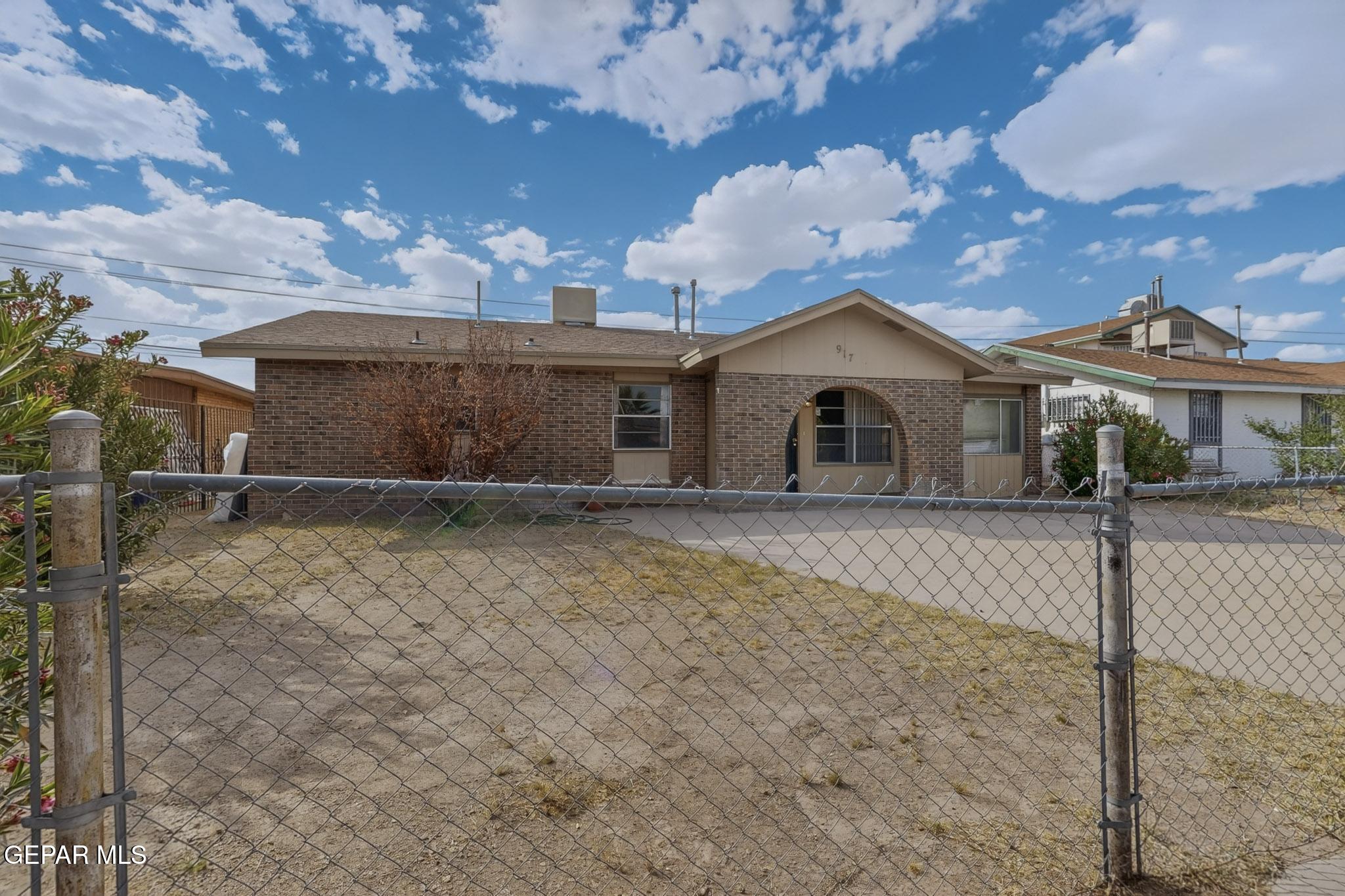 917 Marigold Way El Paso, TX 79907 - Photo 37 of 38 a view of a house with a yard