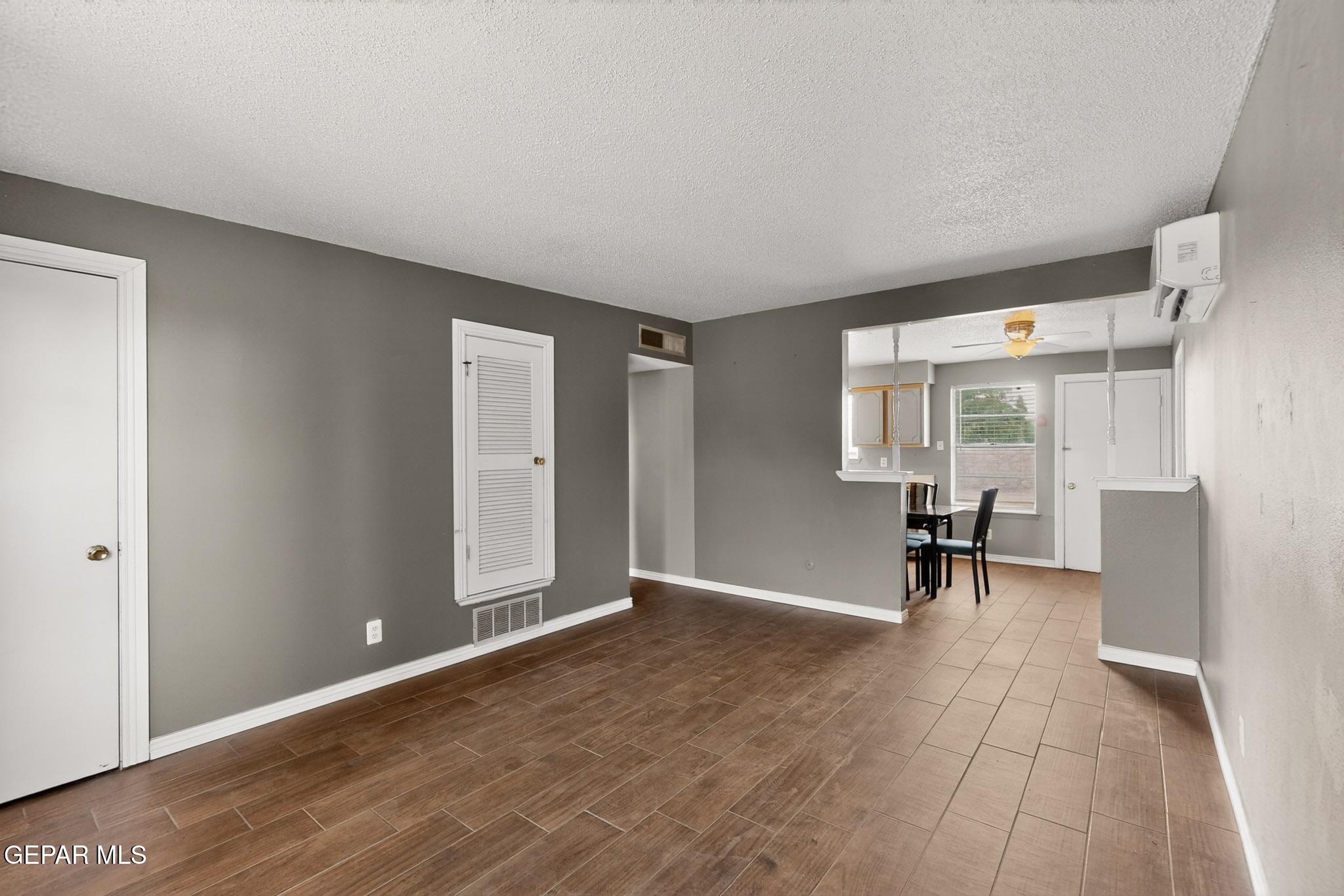 917 Marigold Way El Paso, TX 79907 - Photo 7 of 38 a view of an empty room with a window