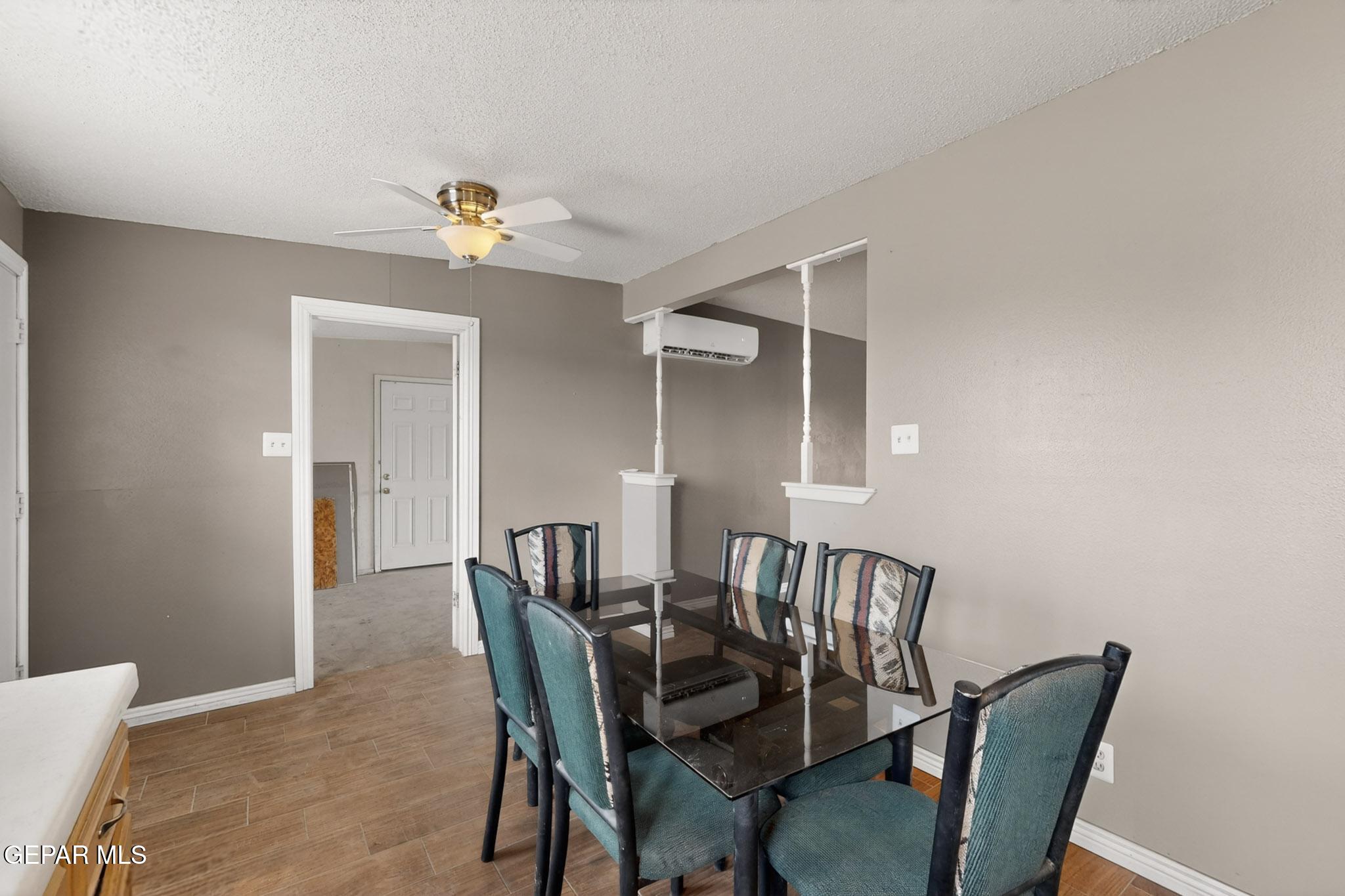 917 Marigold Way El Paso, TX 79907 - Photo 8 of 38 a view of a dining room with furniture and chandelier