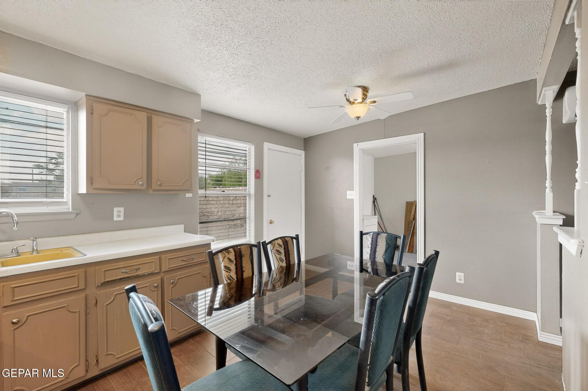 917 Marigold Way El Paso, TX 79907 - Photo 9 of 38 a view of a dining room with furniture and window