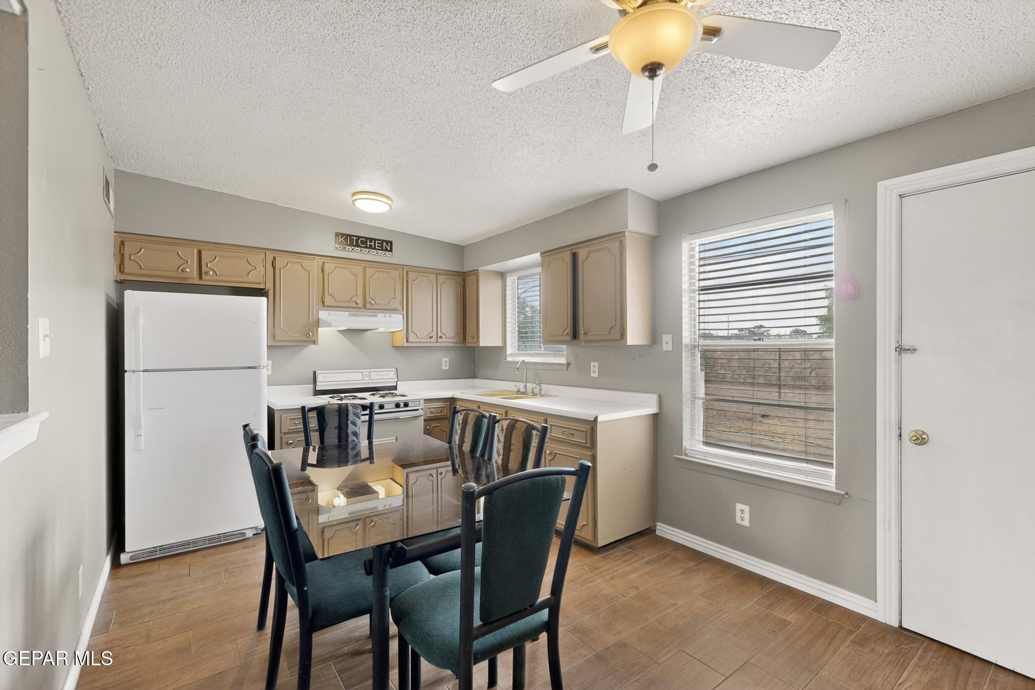 917 Marigold Way El Paso, TX 79907 - Photo 10 of 38 a dining room with furniture and window