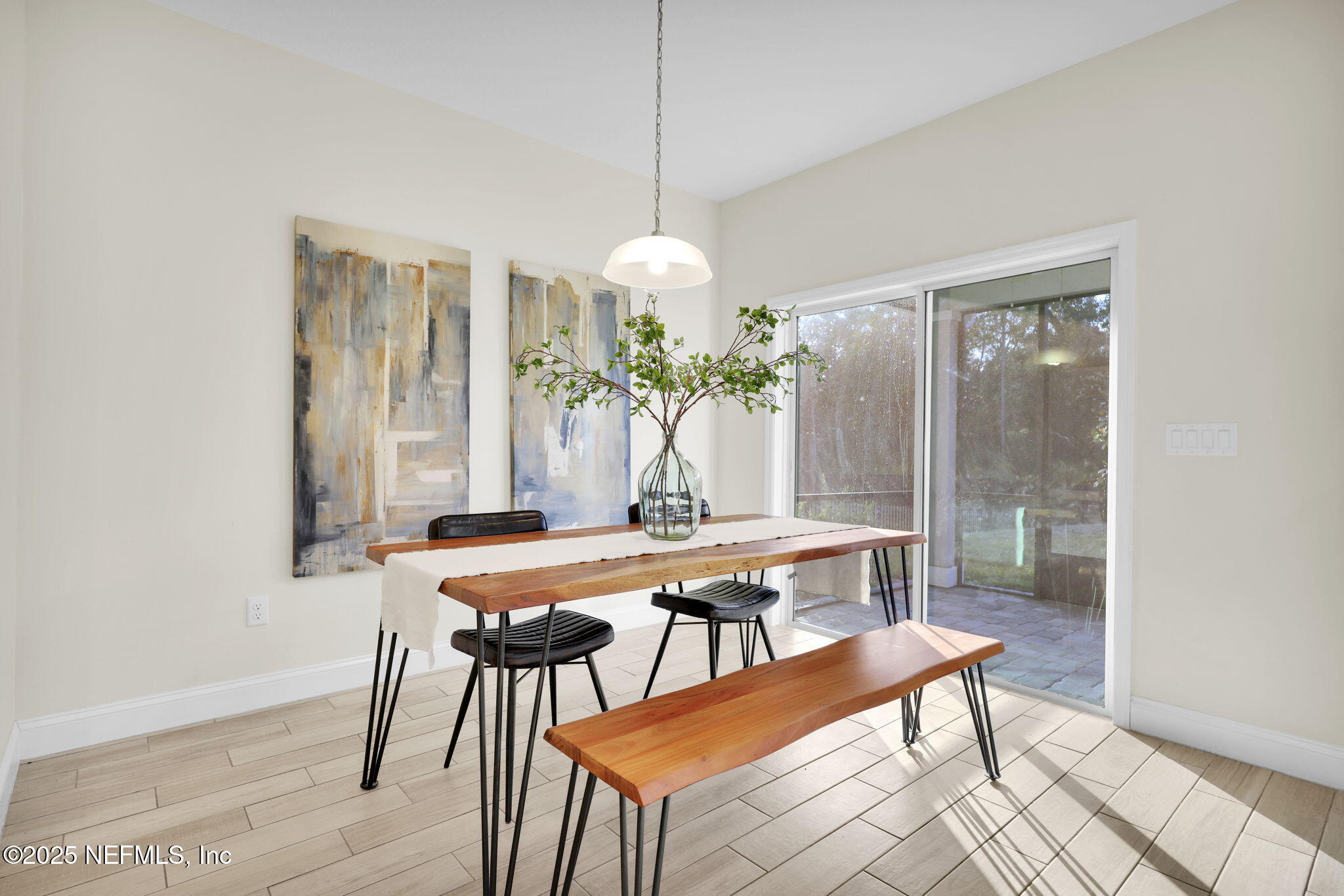 334 Clifton Bay Loop St. Johns, FL 32259 - Photo 11 of 60 a dining room with furniture and window