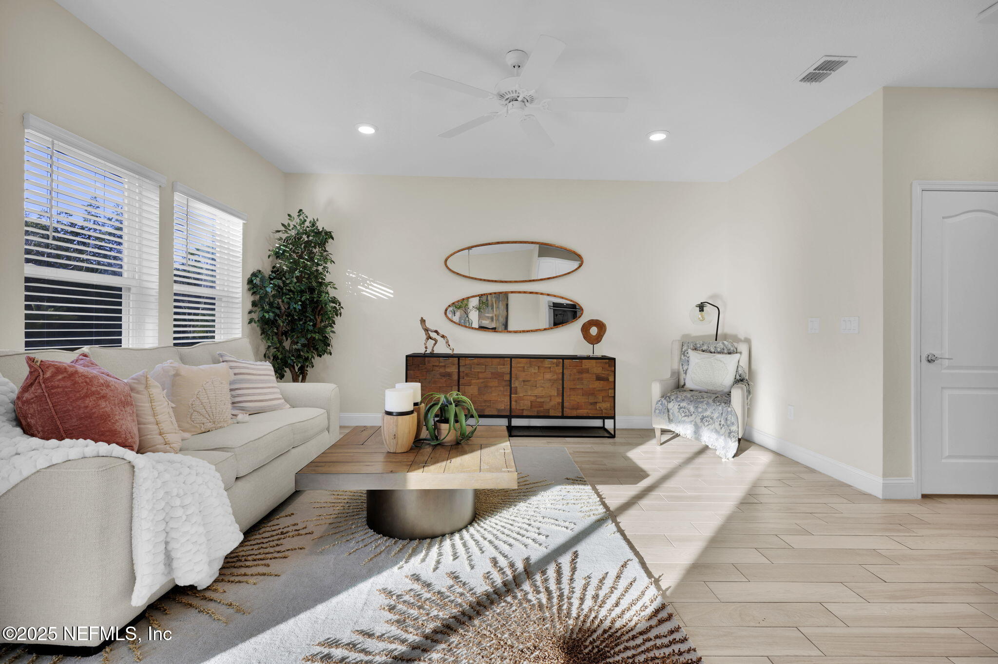 334 Clifton Bay Loop St. Johns, FL 32259 - Photo 14 of 60 a living room with furniture and a large window