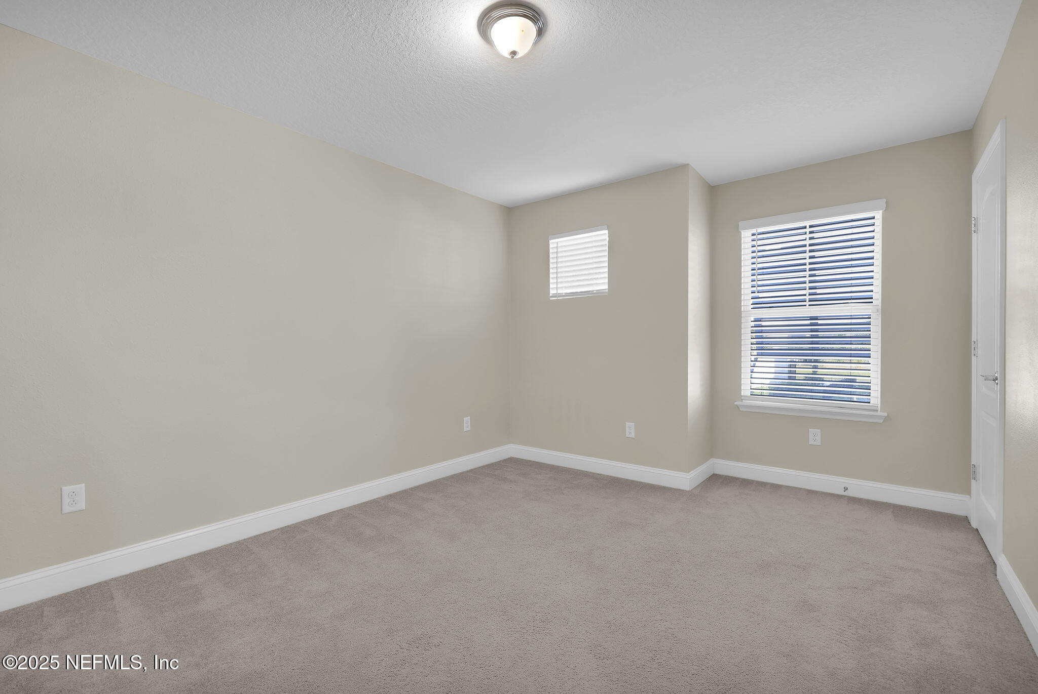 334 Clifton Bay Loop St. Johns, FL 32259 - Photo 26 of 60 an empty room with windows
