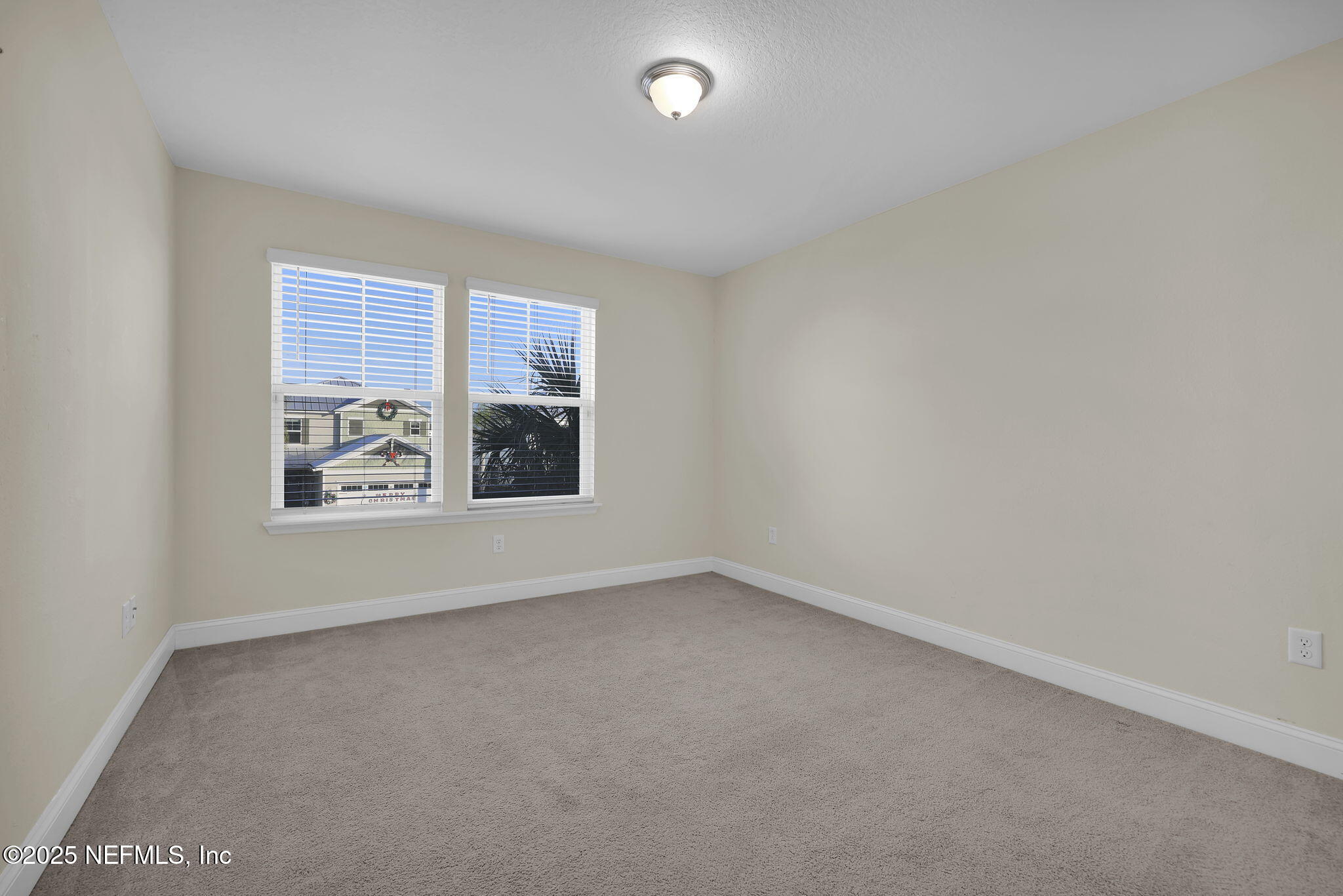 334 Clifton Bay Loop St. Johns, FL 32259 - Photo 27 of 60 an empty room with windows