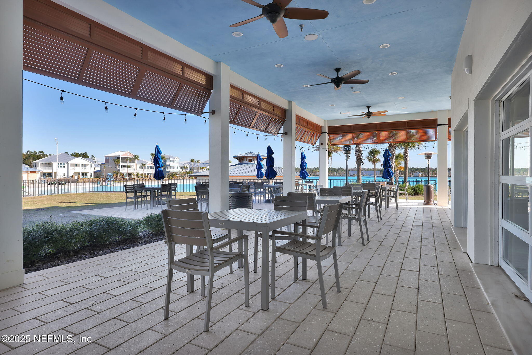334 Clifton Bay Loop St. Johns, FL 32259 - Photo 46 of 60 a outdoor space with lots of table and chairs