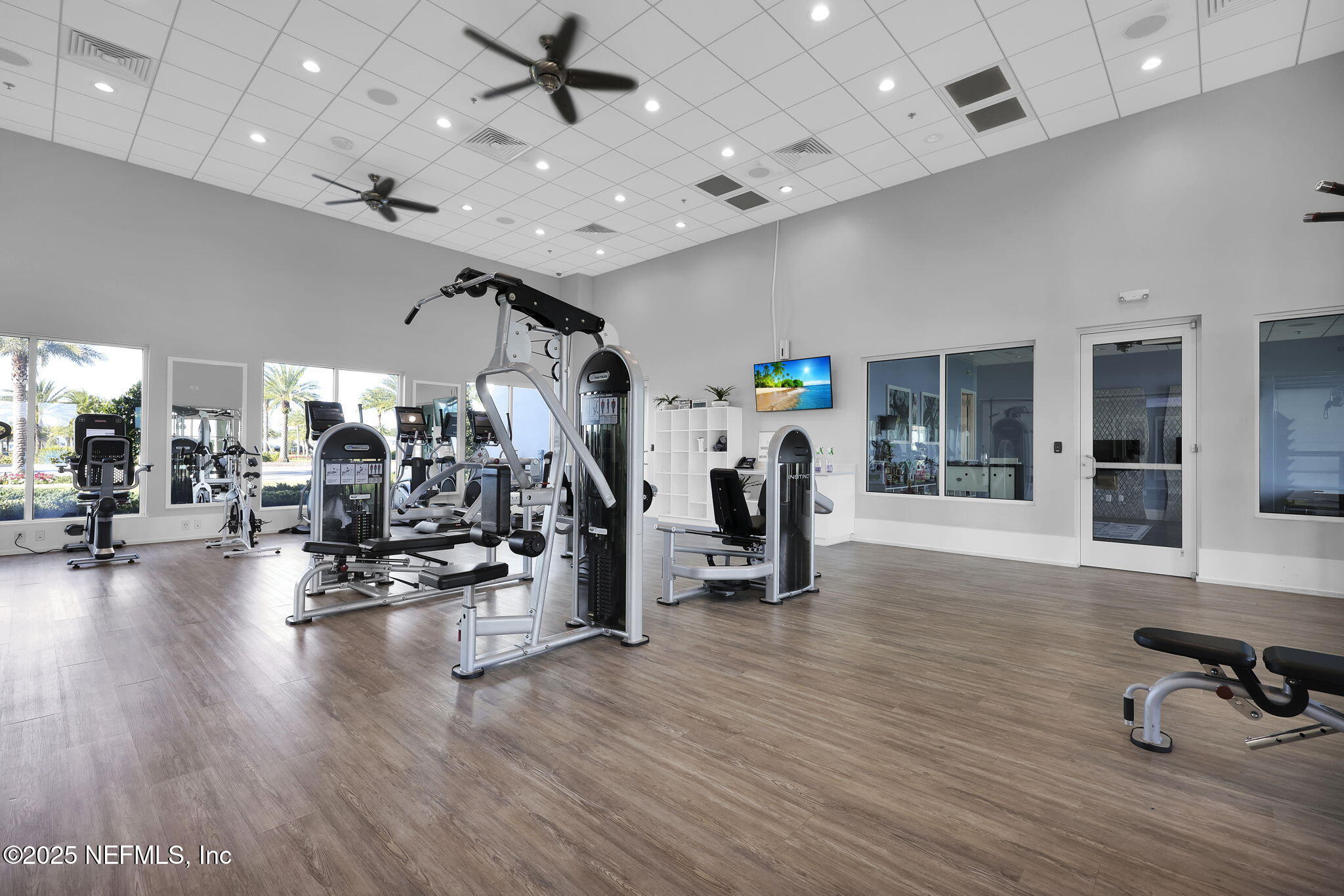 334 Clifton Bay Loop St. Johns, FL 32259 - Photo 48 of 60 a view of a room with gym equipment and a table