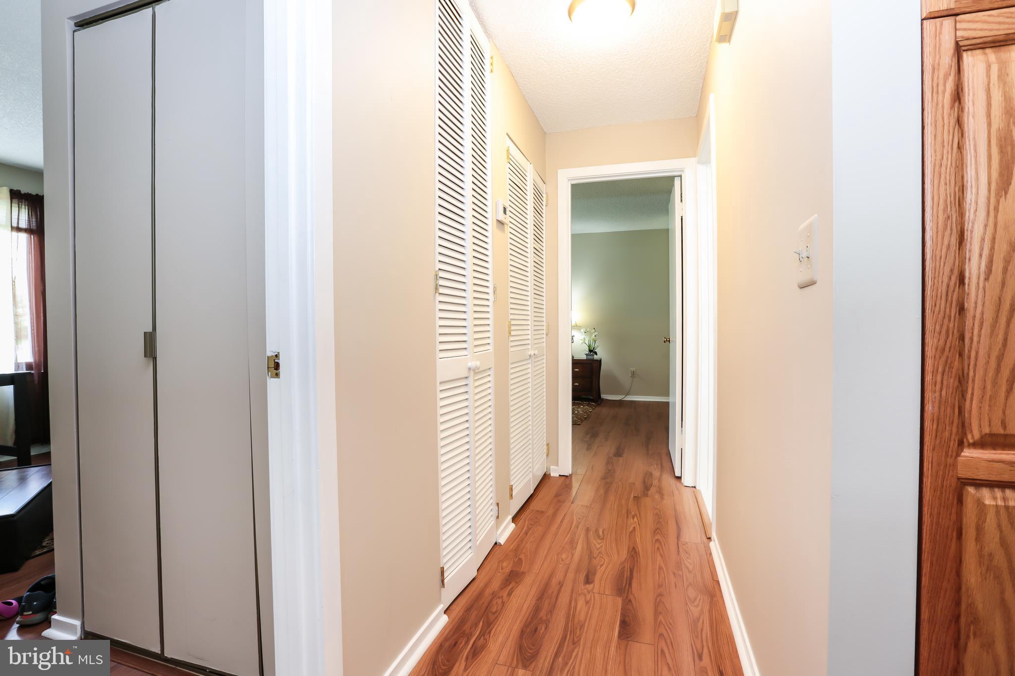 1502 Summerchase Court Reston, VA 20194 - Photo 22 of 26 Hallway with Hickory Floors