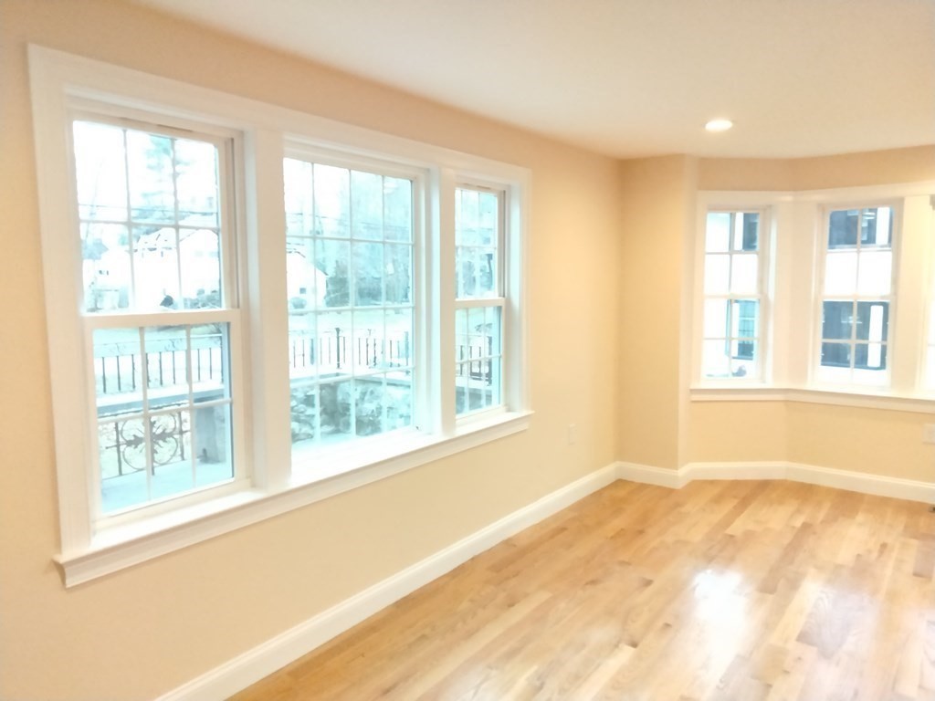 26 Woodleigh Road Dedham, MA 02026 - Photo 11 of 35 a view of an empty room with a window