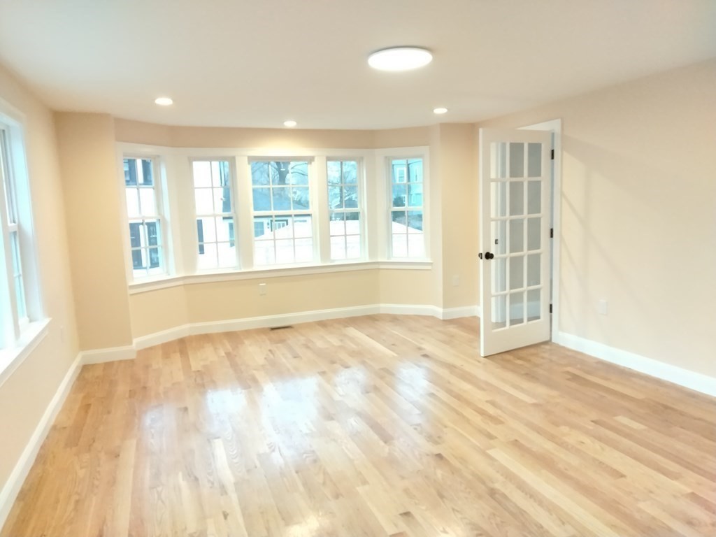 26 Woodleigh Road Dedham, MA 02026 - Photo 12 of 35 a view of an empty room with a window