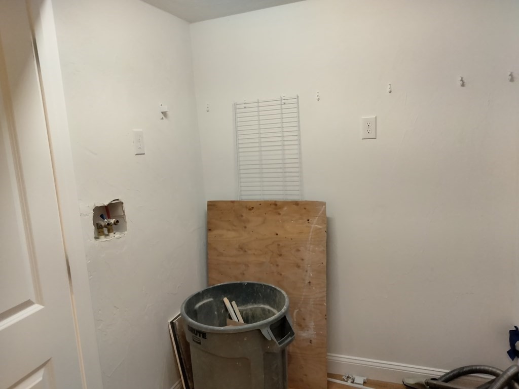 26 Woodleigh Road Dedham, MA 02026 - Photo 15 of 35 a bathroom with a granite countertop sink